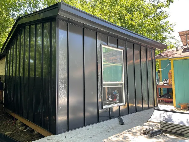 Black standing seam metal wall panels for Metal Roof Installation in Rockdale