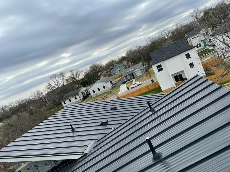 Standing seam metal roof panels with vents for Skylight Repair in Rockdale